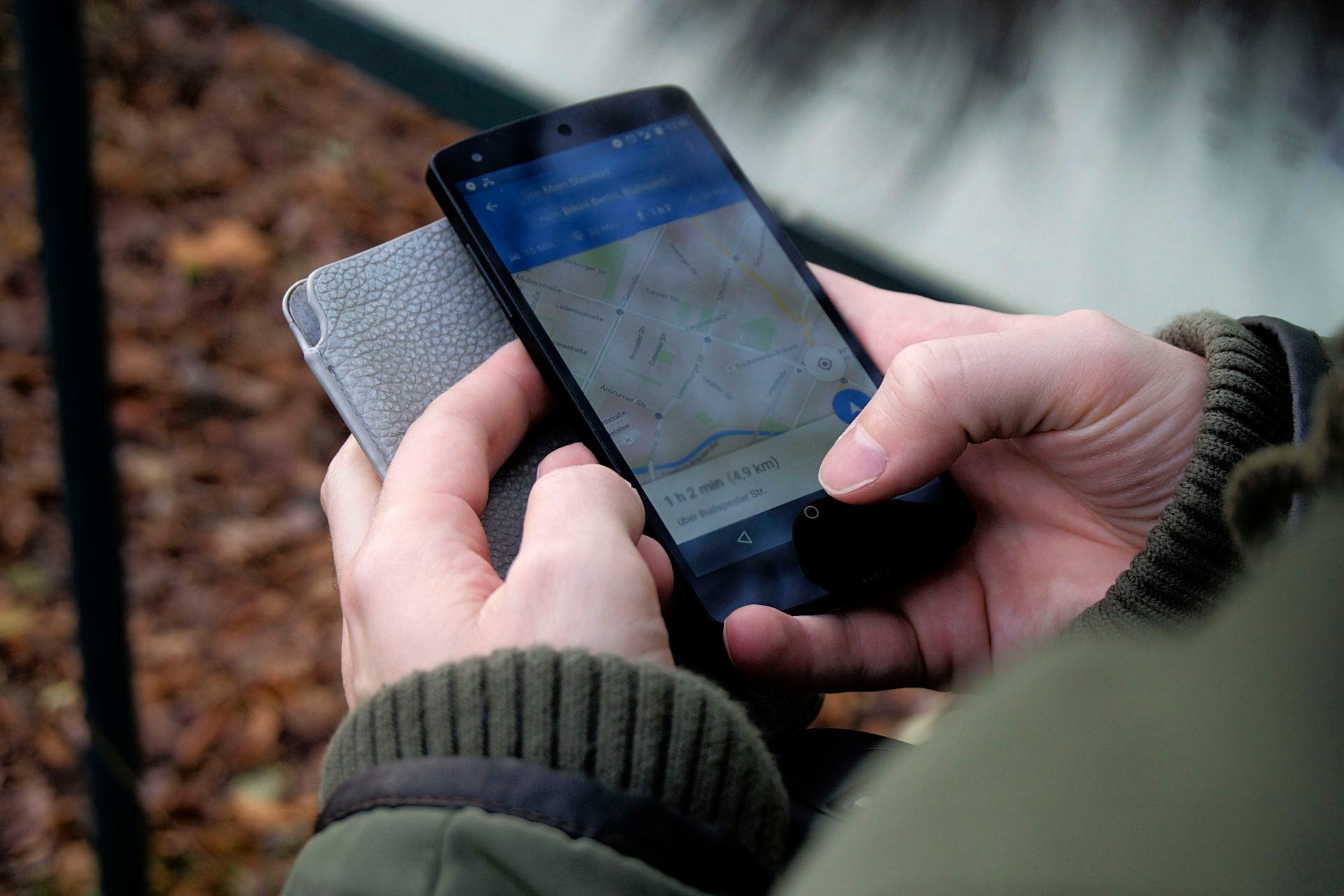 A man using Google Maps app on his phone | Source: Pexels