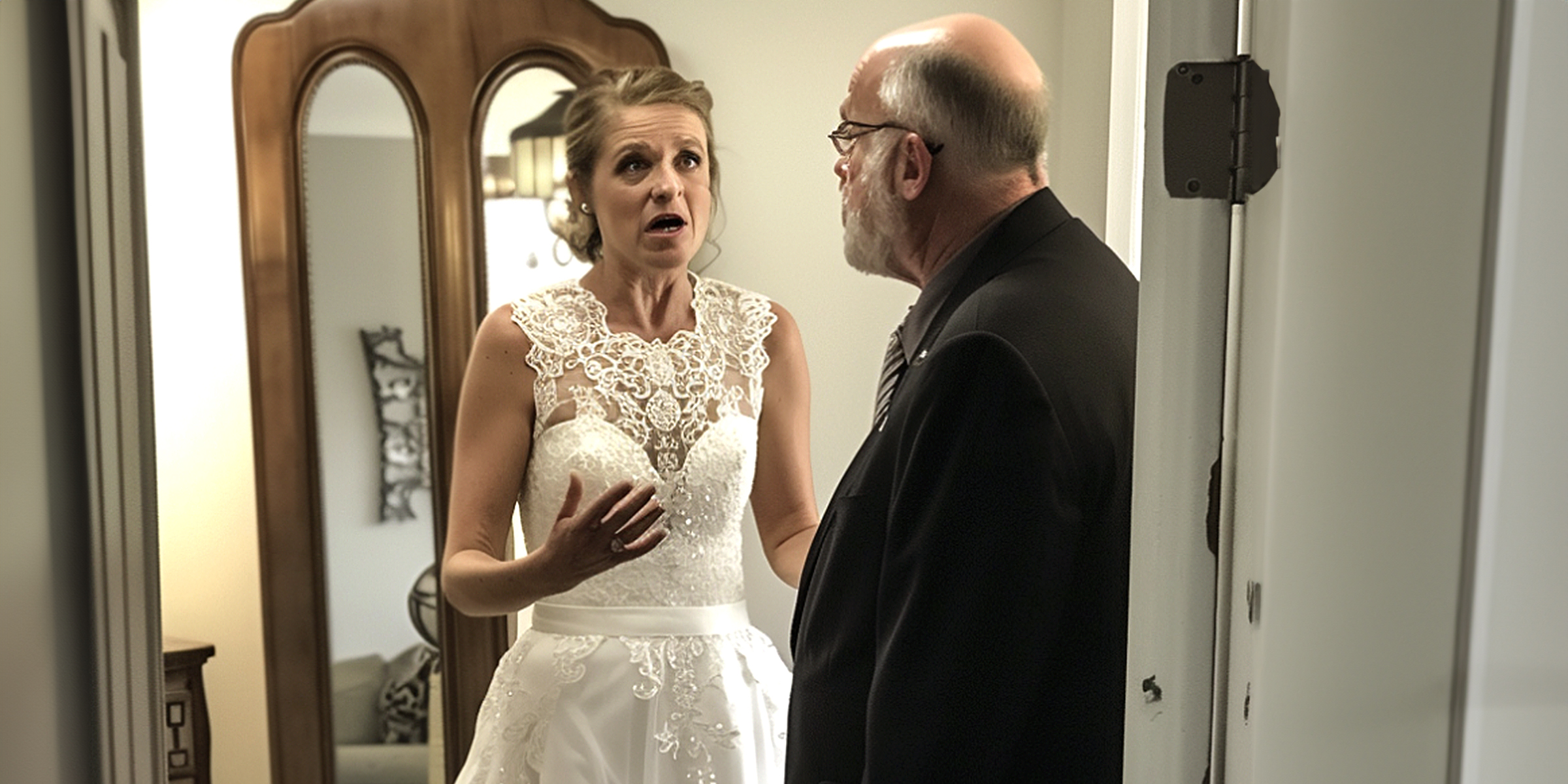 A bride looking surprised as she talks an elderly man | Source: Amomama